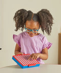Child using Hands On Subtraction Practice Board With Self Checking Dials For Fun Kid Friendly Math Facts Games For Kindergarten