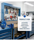 Heavy Duty All Steel 3/8 Inch By 50 Foot Retractable Air Hose Reel with tools in a garage workbench setting