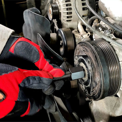 Using AC Clutch Tool Kit For Ford GM Chrysler Removes And Installs Pressed On Clutches And AC Compressor Clutch Kit on vehicle