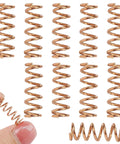 10 Pack Copper Compression Springs For Automotive Heating Plug, 5.3mm Outer Diameter And 16mm Length with one spring held in hand