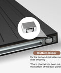 Close-up of bottom roller for 36X84 Inch Black Wood Sliding Barn Door With Concealed Tracks And Soft Close Hardware Kit
