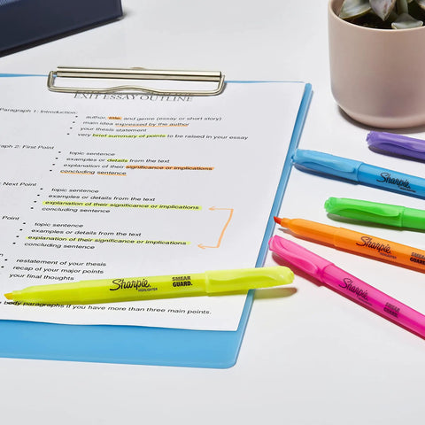 Super Slim Pocket Highlighters With Chisel Tip, Assorted Colors, 24 Count For Back To School And Office next to a completed essay