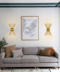 Living room with Brass Mid Century Modern Wall Sconces Set Of 2, Brushed Brass Starburst Wall Lighting above grey sofa.