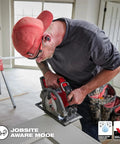 Contractor using a saw wearing Rugged USB Bluetooth Jobsite Ear Buds With RedLithium Power For Pro Contractors, Sweatproof Black Wireless Ear Buds For The Worksite, Easy Pairing, Long-Lasting Battery Life, Built Tough And Comfy Fit, demonstrating jobsite aware mode.