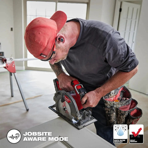 Contractor using a saw wearing Rugged USB Bluetooth Jobsite Ear Buds With RedLithium Power For Pro Contractors, Sweatproof Black Wireless Ear Buds For The Worksite, Easy Pairing, Long-Lasting Battery Life, Built Tough And Comfy Fit, demonstrating jobsite aware mode.