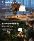 Cordless LED Wood-Grain Table Lamp With Waterproof Shower Design on dinner table and garden, battery-powered, cozy ambience