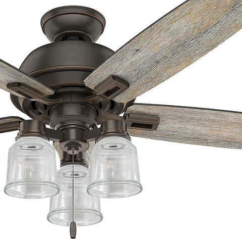 Ceiling fan with Clear Glass Ceiling Fan Light Shade Set, 4 Pack Replacement Covers for Ceiling Fan Globe, installed on wood blades.