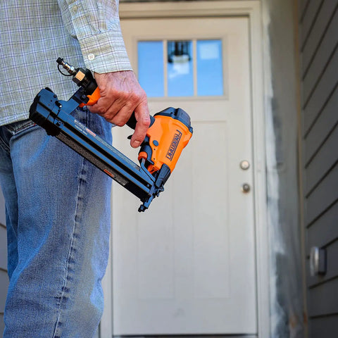 Person holding Next Gen Pneumatic 18 Gauge One And Five Eighths Inch Narrow Crown Stapler with Adjustable Metal Belt Hook.