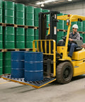 Forklift with Two Drum Spill Containment Pallet With 48 By 24 By 4 Inch Beefy Footprint 2000 Pound Capacity in warehouse
