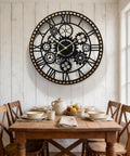 Large Farmhouse Wall Clock For Living Room Decor Visible Gear Dial in kitchen with rustic dining table setting.