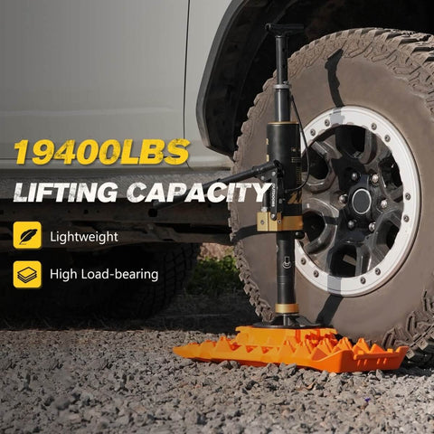 Portable Hydraulic Recovery Jack With Lift Mate For Off Road 4x4 SUVs, ATVs, And UTVs lifting a vehicle tire on rugged surface