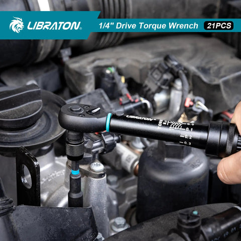 Person using the Bike Torque Wrench One Quarter Inch Drive Five To Twenty Five Newton Meters Micro Click Set in a motorbike engine.