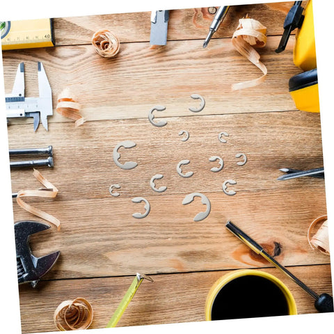 Circlip And Split Washer 300 Piece Set Stainless Steel 304 E Type Retaining Rings in workshop setting with tools.