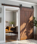 Heavy Duty Seven Point Five Foot Sliding Barn Door Hardware Kit Black with Industrial Bigwheel Hangers shown installed on door