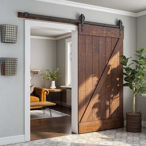 Heavy Duty Seven Point Five Foot Sliding Barn Door Hardware Kit Black with Industrial Bigwheel Hangers shown installed on door