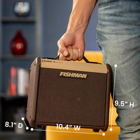 Loudbox Micro 40 Watt Acoustic Guitar Combo Amplifier Bundle With Gearlux XLR Cable Instrument Cable And Austin Bazaar Polishing Cloth For A Gig Ready Room Filling Stage Tone In A Compact Portable Package, held by a person, with dimensions 9.5" H, 10.4" W, 8.1" D