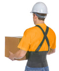 Back view of a black work back brace with removable X-back shoulder straps worn by a construction worker.