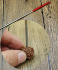 Mini Diamond Needle File Set, 10 Piece, 6 Inch Total Length, 150 Grit, with file in action on wood surface
