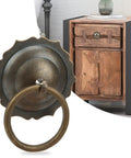 Antique Brass Cabinet Knob With U Shaped Needle Mounting Kit for doors, showing hand-finish detailing, with vintage wooden cabinet.