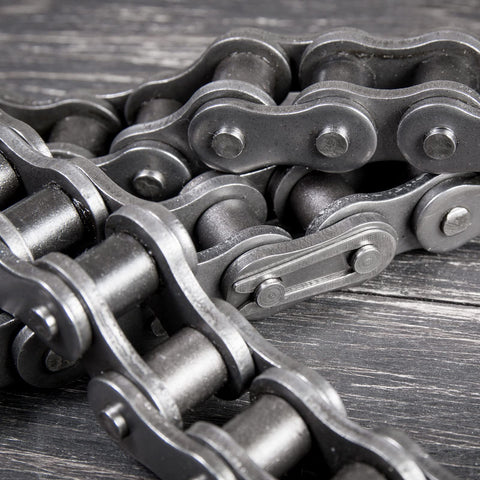 Close-up of Three-Quarter Inch Pitch 12B Metric Standard Roller Chain 5 Feet Carbon Steel Industrial Drive Chain
