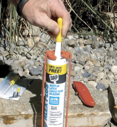 Reusable Tube Sealer With Puncture Pin For Caulk, Four Pack, Keeps Open Tubes Sealed Tight Between Jobs, Stops Dry Out, Pro DIY Tool That Preserves Caulk Freshness And Reduces Waste, yellow-handled caulk tube sealer on outdoor caulk tube