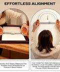 All In One Picture Hanging Tool That Levels Dead Straight No Sweat Accurately Marks Nail Spots For Frames enabling easy measurement of frame dimensions.