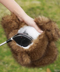 Hand putting driver in Funny Plush Bear Golf Club Head Cover For 460cc Driver Fits Standard Size Universal Fit Ultra Soft Faux Fur