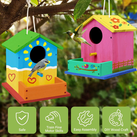 DIY Wooden Bird House Kit For Kids Ages 4 And Up Build And Paint Craft Set With Pre Drilled Pieces Includes Paints And Brushes, Easy To Follow Instructions For Creative Family Fun. two painted wooden birdhouses hanging on tree branches