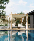 10x10 Ft Outdoor Pergola With Retractable Canopy, Metal Gazebo With Imitation Wood Grain Columns, Side Mesh Screens by a pool