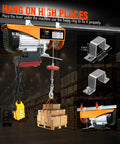 Electric hoist mounted to a beam with orange housing and yellow remote, 880 lb capacity lifting a pallet of boxes.