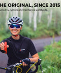 Real Deal No Scratch Bike Tire Levers Set Of Two For Smooth Bicycle Wheel Maintenance And Quick Road Mountain Gravel Tire Changes Compact Design That Snaps Securely held by a cyclist in a forest setting.
