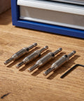 Beavorty Premium Steel And Carbide Tipped Electric Drill Pilot Bits For Cabinet Hinge Installations With Reinforced Guide Sleeve displayed on wood.