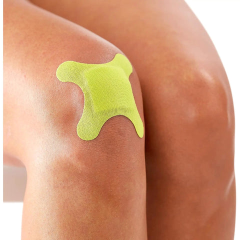 Tough As Nails Antibacterial Bandages For Elbows And Knees 3X3 Inch on a knee, showcasing a secure, elastic fit.