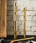Brass Drift Punch Set, 3 Piece, Three Sizes Three Quarter Inch, One Half Inch, and Three Eighth Inch, on a workbench