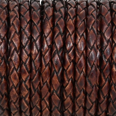Close-up of Genuine Round Braided Leather Cord For DIY Jewelry Making And Crafts 3mm Thick 5 Meters Long Antique Brown Distressed Rope