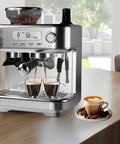 Grind To Order Freshness With This All In One Espresso Machine Packing A Built In Conical Burr Mill 15 Bar Pump Strength PID Temp Control And Fast Milk Frothing For Killer Lattes At Home, stainless steel with dual espresso shots brewing.