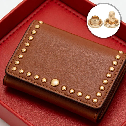Leather Craft Rivet Kit For DIYers 100 Sets Of Golden Copper Fasteners Durable Metal Snaps And Rivets For Jeans Leather Bags Wallets And More Multipurpose Fastener Set applied to brown leather wallet