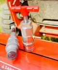 Half Inch ISO 16028 Flat Face Skid Steer Male Hydraulic Quick Coupler Pressure Decompression Relief Release Tool shown on equipment
