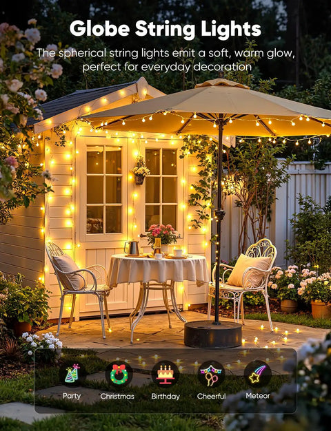 Cozy patio decorated with Globe String Lights 33 Feet With 100 LED Bulbs Warm White Fairy Lights for outdoor evening ambiance.