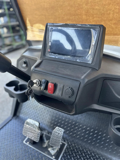 Close-up of HD LED display and controls in Heavy Duty Four Seater Electric Golf Cart With Premium Luxury Seats And Badass Off Road Tires.