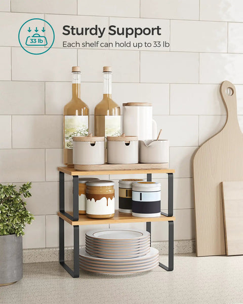 No Sweat Set Of Two Cabinet Organizer Shelves That Serve As A Slick Kitchen Spice Rack and Countertop Pantry Station with jars and plates.
