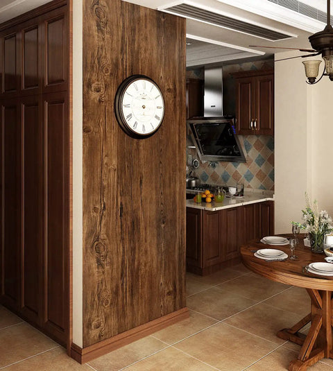 Brown Wood Grain Contact Paper Peel And Stick For Cabinets And Countertops applied in a kitchen with a wall clock and dining table.