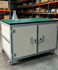 Badass Antistatic Workbench With Smooth Rolling Casters And Locking Foot Brakes, Three Tier Heavy Duty Mobile Prep Table For Garage Or Warehouse Shop Jobs 120X80X75cm in industrial setting.