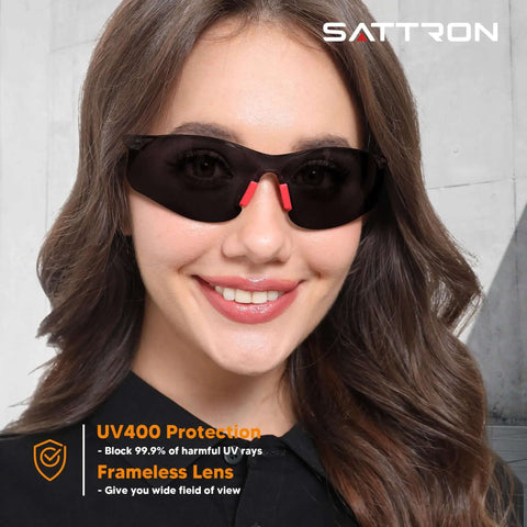Woman wearing Tinted Safety Glasses 24 Pack Bulk For Men And Women Eye Protection With UV Shield ANSI Z87.1 Scratch Resistant Eyewear