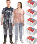 Two adults wearing clear rain ponchos with pack of 80 next to them, Clear 80 Pack Disposable Adult Rain Ponchos For Theme Parks And Outdoor Adventures