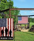 American Soldier Thank You Garden Flag 12x18 Burlap Double Sided For Fourth Of July Independence Day Memorial Day Yard Outdoor Decor USA Flags Weather Resistant Durable Sleeve Hanger Fits Standard Flag Stands displayed in garden, showing silhouettes of soldiers and 'Thank You' text with large American flag in background on gazebo.