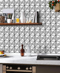 Peel And Stick Backsplash Tile Set With Glass And Metal Pinwheel Pattern in modern kitchen setup, 12x12 inch mosaic tiles.