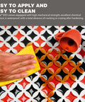 Hand wiping tiles with Starlike EVO Epoxy Grout For Tile Blue Denim 340 Easy To Apply No Fuss And Clean Bathroom Pool Backsplash Grout 2.5 Kg 5.5 Lbs Smooth Color Durable Finish Ideal For Porcelain Stoneware Glass Mosaic, beside red cups.