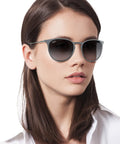 Woman wearing Erika Metal Round Sunglasses Unisex Design For Men And Women, Lightweight Frame With Keyhole Bridge
