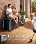 Couple sitting on Huge 120 Gallon Resin Deck Box Weatherproof Outdoor Storage Bench Heavy Duty Lockable Container For Garden Tools Pool Gear